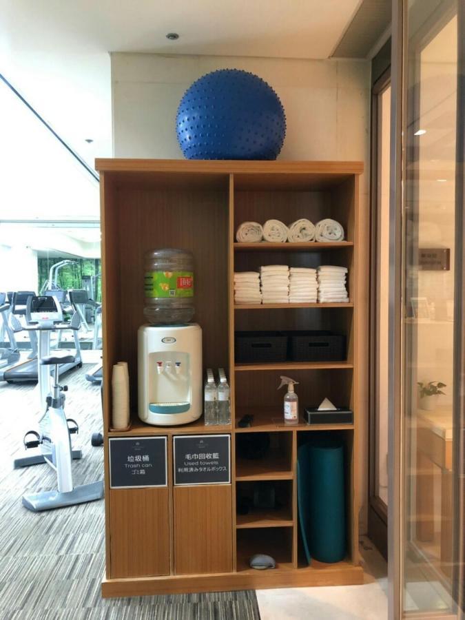 Hotel Royal Hsinchu Exterior photo A water dispenser in a gym