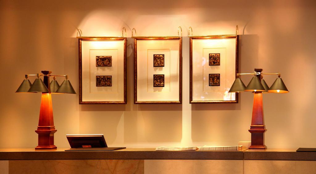 Hotel Royal Hsinchu Interior photo A display of framed stamps